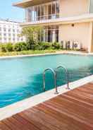 SWIMMING_POOL Furnished 2BR at Elpis Apartment By Travelio