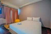 Kamar Tidur Simple Studio Apartment at Grand Kamala Lagoon By Travelio