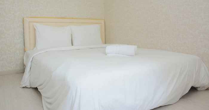 Kamar Tidur Cozy and Tranquil 2BR Apartment at Gading Nias Residence By Travelio