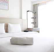 Bedroom 4 Bright Studio Room Apartment at Gateway Pasteur By Travelio