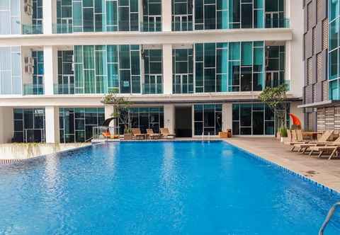 Swimming Pool Nice and Best Price 2BR Apartment at Brooklyn Alam Sutera By Travelio