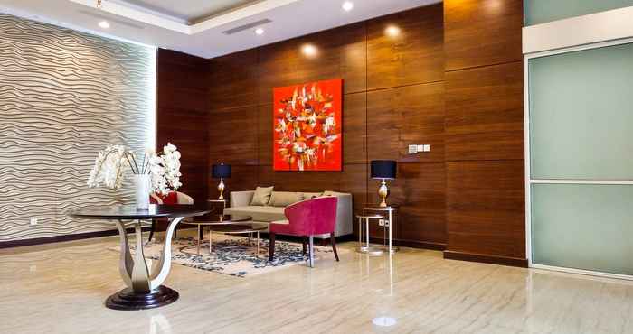 Lobby Homey and Vintage Studio Apartment at Nifarro Park By Travelio