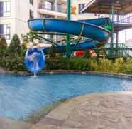 Swimming Pool 2 Nice and Modern 1BR Apartment The Mansion Kemayoran By Travelio
