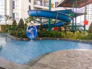 Swimming Pool 4 Nice and Modern 1BR Apartment The Mansion Kemayoran By Travelio