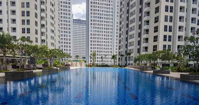 Swimming Pool Modern Style 2BR Serpong Mid Town Apartment By Travelio