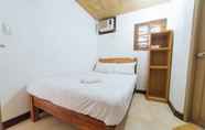 Bedroom 3 RedDoorz @ Sabang Beach Baler