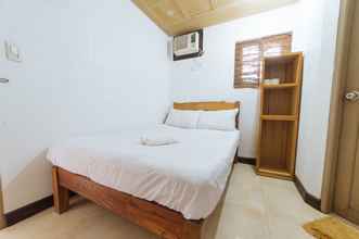 Bedroom 4 RedDoorz @ Sabang Beach Baler