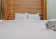 Bedroom 2 Cozy 2BR Connected to Mall Apartment at Green Pramuka City By Travelio