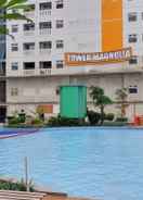 SWIMMING_POOL Cozy 2BR Connected to Mall Apartment at Green Pramuka City By Travelio