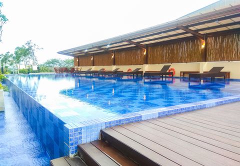 Swimming Pool Simply Studio at Azalea Suites Cikarang Apartment By Travelio