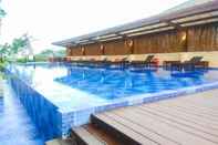 Kolam Renang Simply Studio at Azalea Suites Cikarang Apartment By Travelio