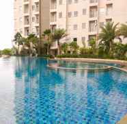 Swimming Pool 2 Modern and Comfy 2BR Mustika Golf Apartment By Travelio