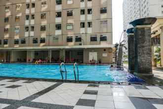 Swimming Pool 4 Minimalist and Affordable 2BR Apartment at Gading Nias Residence By Travelio