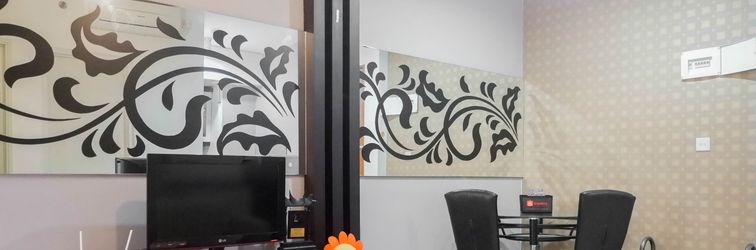 Lobby Minimalist and Cozy 2BR Apartment at East Coast Residence By Travelio