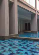 SWIMMING_POOL Relaxing 2BR at Royal Olive Residence By Travelio