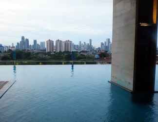 Swimming Pool 2 Elegant Living 1BR at Kemang Mansion Apartment By Travelio