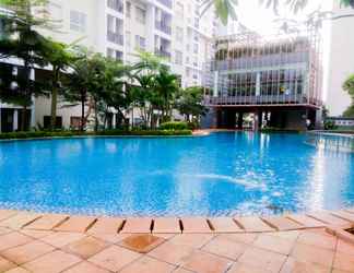 Swimming Pool 2 Good Choice 1BR @ Scientia Residence Apartment By Travelio