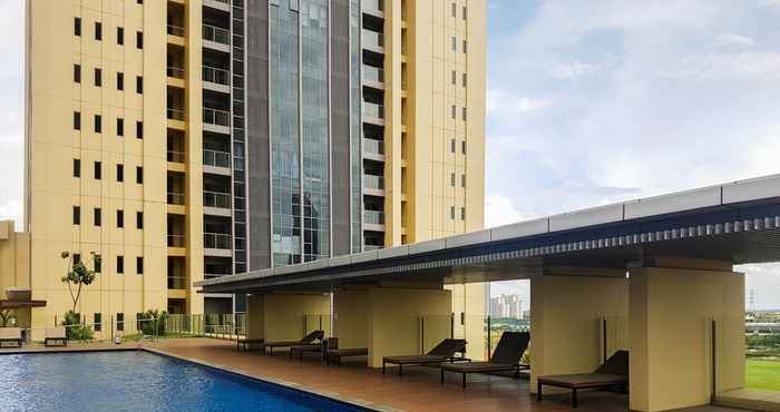 Swimming Pool Pleasant and Lavish 2BR at The Branz BSD Apartment By Travelio