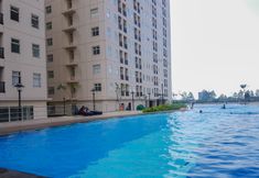 Swimming Pool 2 Cozy Living Studio Room at Ayodhya Residences Apartment By Travelio