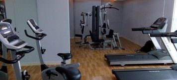 ห้องออกกำลังกาย 2 Chic and Homey 2BR Apartment at Bassura City By Travelio