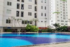 สระว่ายน้ำ Chic and Homey 2BR Apartment at Bassura City By Travelio