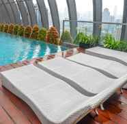 Swimming Pool 2 Comfy and Spacious 2BR L'Avenue Apartment By Travelio