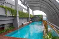 Swimming Pool Comfy and Spacious 2BR L'Avenue Apartment By Travelio