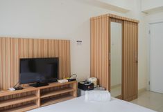 Bedroom 4 Homey Studio Green Pramuka Apartment next to Mall By Travelio