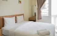 Bedroom 3 Homey Studio Green Pramuka Apartment next to Mall By Travelio