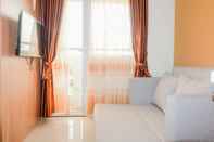 Common Space Fully Furnished 2BR Green Pramuka Apartment By Travelio