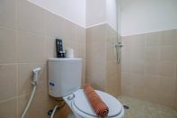 In-room Bathroom Graceful Studio Apartment at Podomoro Golf View By Travelio