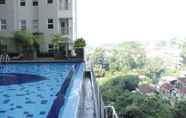 Swimming Pool 7 Modern and Minimalist 1BR at Parahyangan Residence Apartment By Travelio