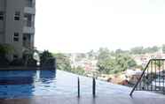 Swimming Pool 6 Modern and Minimalist 1BR at Parahyangan Residence Apartment By Travelio