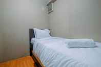 Kamar Tidur Homey and Strategic 2BR at Kalibata City Apartment By Travelio