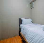Bedroom 2 Homey and Strategic 2BR at Kalibata City Apartment By Travelio