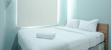 Bedroom 4 Comfy and Fully Furnished 1BR Apartment at Vittoria Residence By Travelio