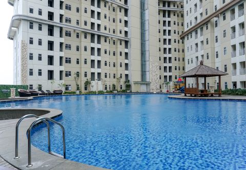 Swimming Pool Comfy and Fully Furnished 1BR Apartment at Vittoria Residence By Travelio