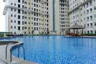 Swimming Pool Comfy and Fully Furnished 1BR Apartment at Vittoria Residence By Travelio