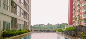 Swimming Pool 2 Comfy 2BR Apartment at Taman Melati Margonda By Travelio
