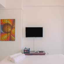 Bedroom 4 Best Price and Comfy Studio Apartment at Gunung Putri Square By Travelio