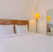 Bedroom 2 Best Price and Comfy Studio Apartment at Gunung Putri Square By Travelio