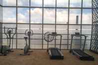 Fitness Center Modern Studio Apartment at The Oasis Cikarang By Travelio