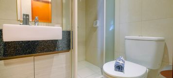 In-room Bathroom 5 Brand New and Posh 2BR Kuningan Place Apartment By Travelio