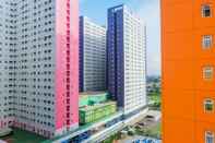 Exterior Warm and Comfy 2BR Green Pramuka Apartment near Mall By Travelio