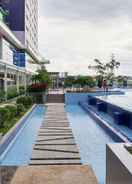 SWIMMING_POOL Warm and Comfy 2BR Green Pramuka Apartment near Mall By Travelio