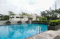 Swimming Pool Nice 2BR Apartment with City View at The Aspen Residence By Travelio