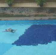 สระว่ายน้ำ 2 Comfy 3BR Apartment at Green Palm Residences By Travelio