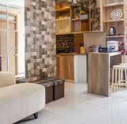 Lobby 4 Comfy 3BR Apartment at Green Palm Residences By Travelio