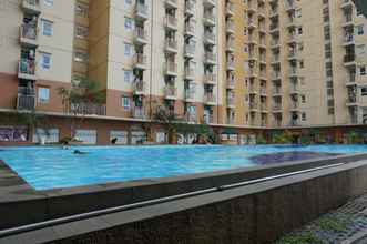 Kolam Renang 4 Comfy 3BR Apartment at Green Palm Residences By Travelio