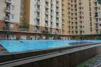 Swimming Pool Comfy 3BR Apartment at Green Palm Residences By Travelio